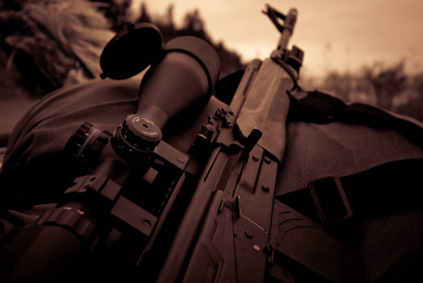 istock Automatic tactical sniper rifle with optical scope close-up, military ammunition 1281225293