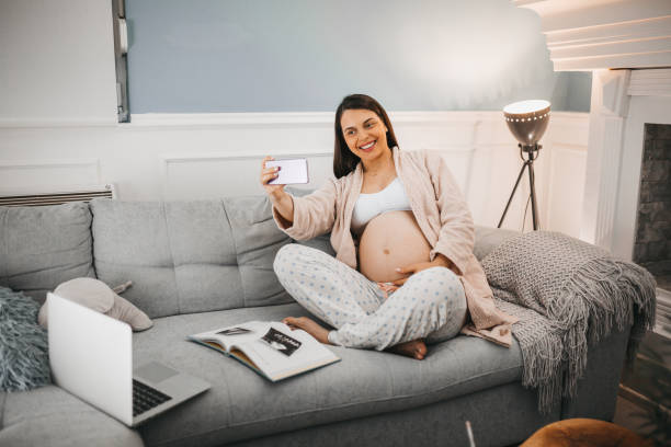 istock A pregnant woman takes a selfie 1281227021