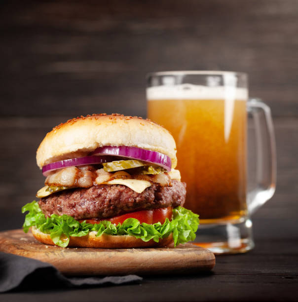 istock Homemade tasty beef burger and beer 1281227219