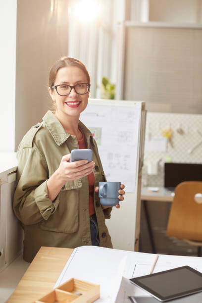 istock Smiling Young Woman at Coffee Break 1281231969