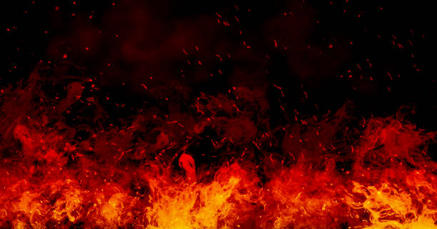 istock Orange fire or flames with sparkles and smoke in black background. 1281234038