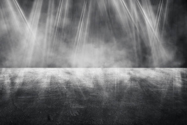 istock Studio dark room concrete floor grunge texture background with lighting effect. 1281235046