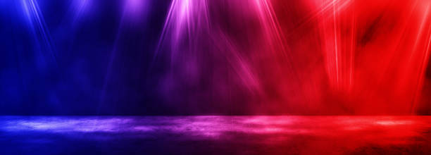 istock Studio dark room with fog or mist and lighting effect red and blue on concrete floor gradient background. 1281235181