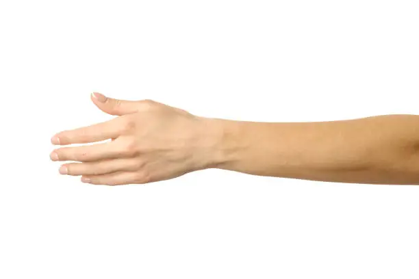 Giving hand for handshake. Woman hand with french manicure gesturing isolated on white background. Part of series