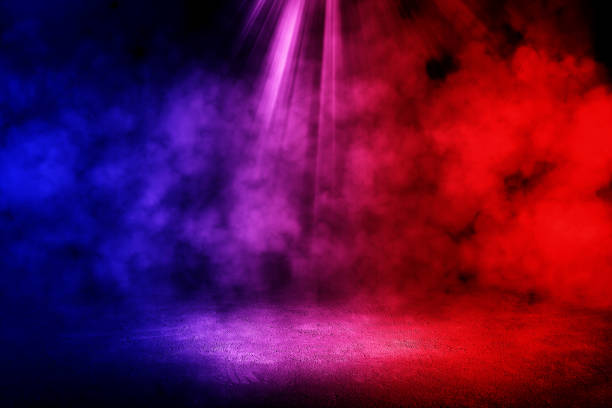 istock Studio dark room with fog or mist and lighting effect red and blue on concrete floor grunge texture background. 1281235211