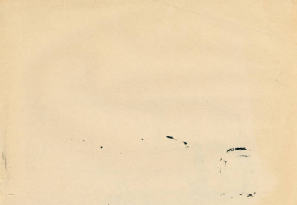 istock blank old grunge paper with black ink stains texture background 1281235891