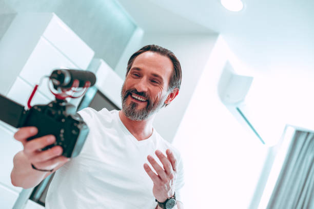 istock Excited man talking on the camera about his day 1281235980