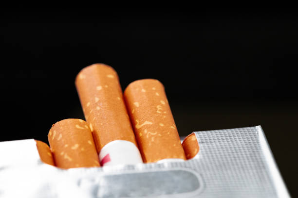 istock Open new pack of  cigarettes close up 1281235999