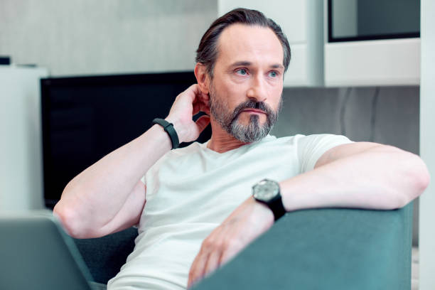 istock Serious Caucasian man being at home alone at daytime 1281237609