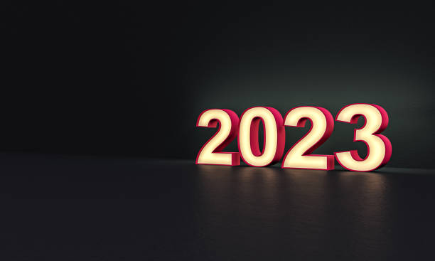 istock 2023 year - numbers - frosted glass - dark background - 3d rendering 1281240297
