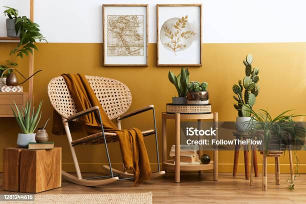 Stylish Composition Of Living Room Interior With Design Rattan Armchair Two Mock Up Poster Frames Plants Cube Palid And Personal Accessories In Honey Yellow Home Decor Template Stock Photo - Download Image Now
