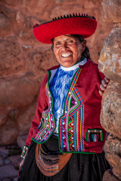 istock Peruvian woman at Inca ruins, The Sacred Valley, Peru 1281246251