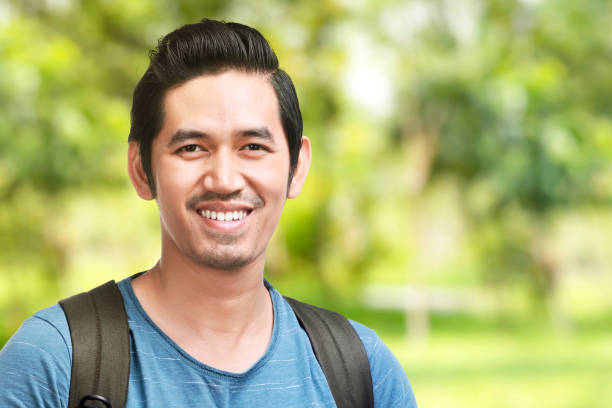 istock Asian man with smile on his face 1281247571