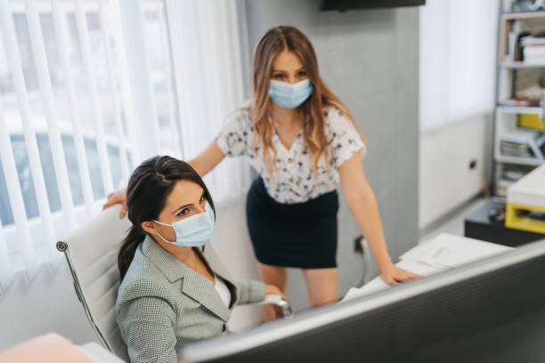 istock Female colleagues working together in office 1281247935