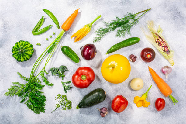 istock Fresh select seasonal vegetables on light textured backdrop,  top view 1281248517