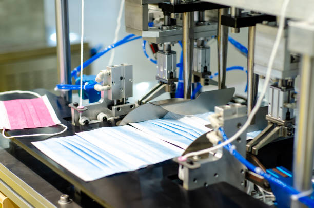 istock Medical Face Mask Making Machine. Mask Production Line 1281248681
