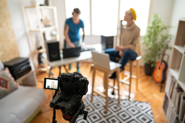 istock Performance group recording video for their new song in the music studio 1281249974