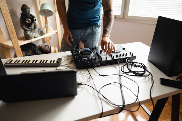 istock Dj and producer practicing at home 1281250055