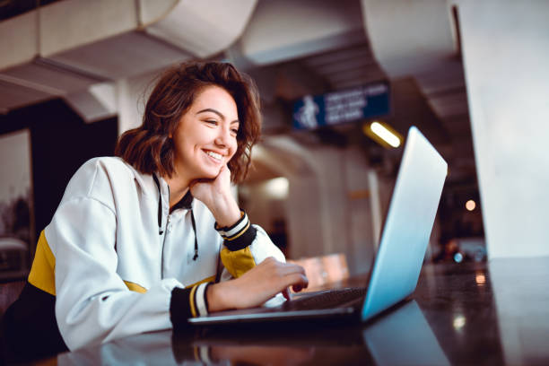 istock Smiling Female Freelance Working On Laptop At Home 1281252835