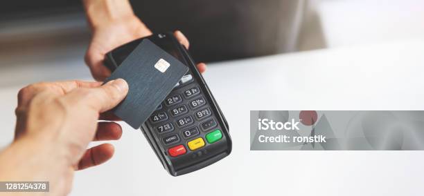 Nfc Contactless Payment By Credit Card And Pos Terminal Copy Space Stock Photo - Download Image Now