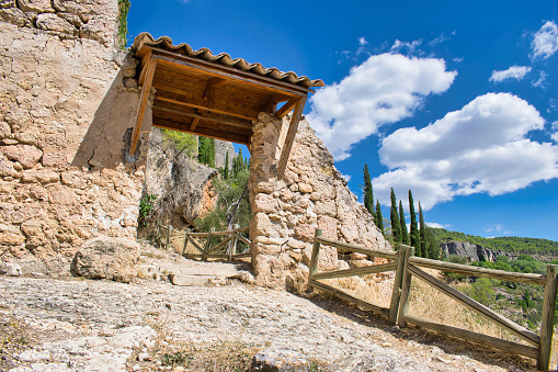 Antigua puerta rural en ruinas en el sendero de las hoces del rio Jucar y Huecar que bordea la ciudad de Cuenca photo