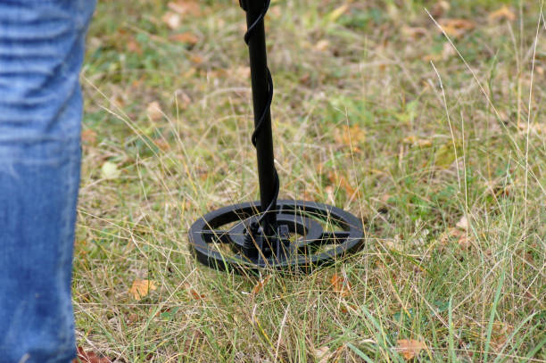 istock Man searching precious metal with a metal detector 1281255865