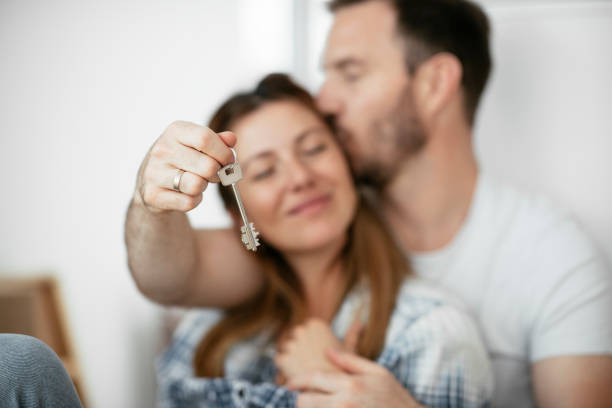 istock Happy couple is unpacking their belongings. 1281258670