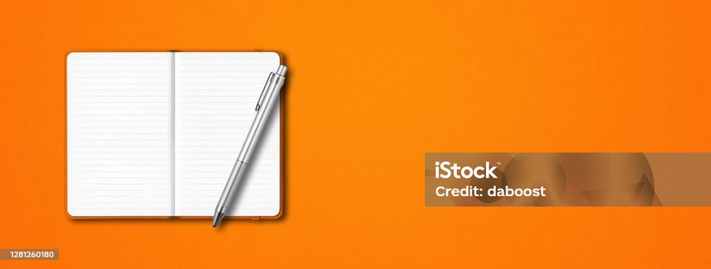 Orange open notebook with a pen isolated on colorful background. Horizontal banner Orange open lined notebook mockup with a pen isolated on colorful background. Horizontal banner Orange Color Stock Photo