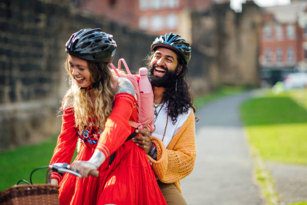 istock Young Couple Having Fun on Bike 1281260650