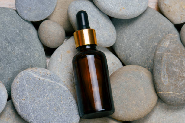 istock eauty care oil on a gray stone background 1281263138