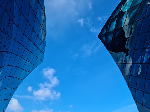 A blue sky and the glass skyscraper
