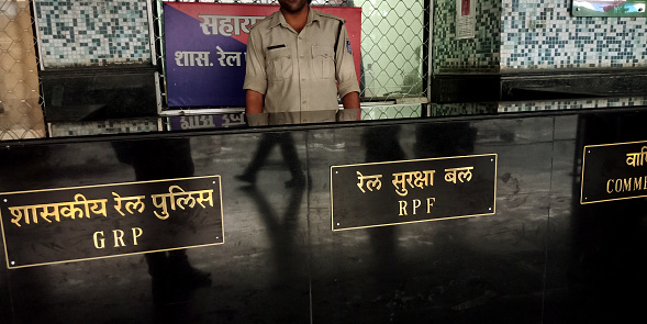 DISTRICT JABALPUR, INDIA - AUGUST 07, 2019: Indian railway police force officer on duty at station platform.