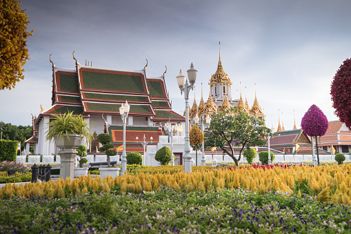 Maha Chetsadabodin Royal Pavilion and Wat Ratchanatdaram temple or Loha Prasat Metal Castle at twilight, landmark and famous place of Bangkok, Thailand