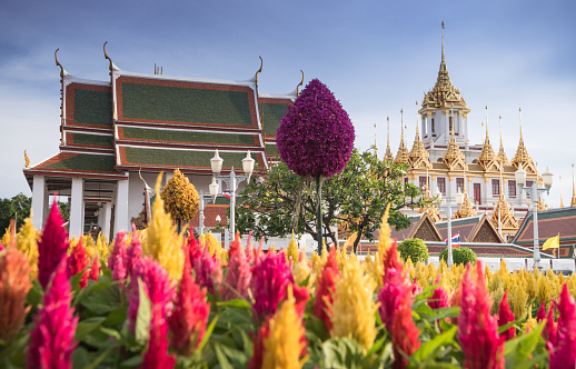 Maha Chetsadabodin Royal Pavilion and Wat Ratchanatdaram temple or Loha Prasat Metal Castle at twilight, landmark and famous place of Bangkok, Thailand