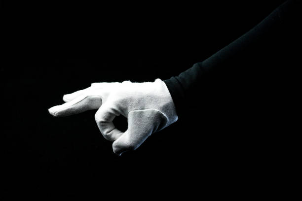 istock A hand wearing white glove on black background showing ZERO sign 1281272736