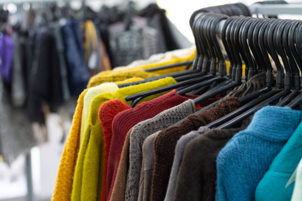 istock Different colorful clothes on hangers. Sale concept 1281281566