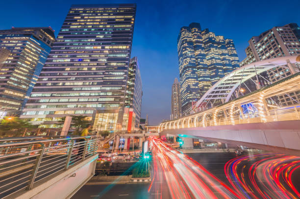 istock Bangkok skyline and skyscraper with bridge link between mrt and bts mass transportation on Sathorn Road center of business in Bangkok, Thailand. 1281281839