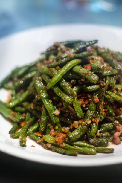 istock Chinese stir fried green bean - fried yard long bean 1281283434