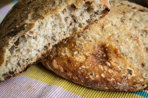 istock two loaf of sourdough bread on tablecloth. spongy bread crumb 1281284320