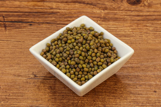 istock Vegetarian cuisine - dry green lentil 1281284612
