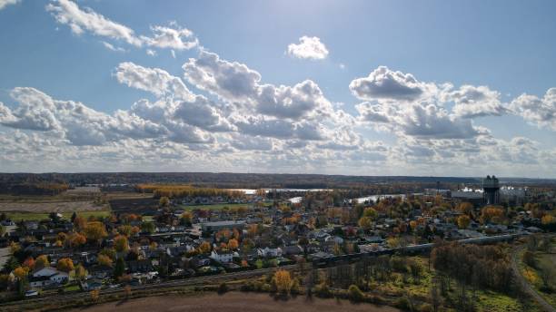 istock Beautiful blue cloudy sky over a small village. 1281286855