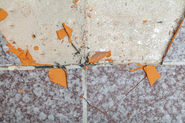 istock Shards of tiles lie on floor 1281287341