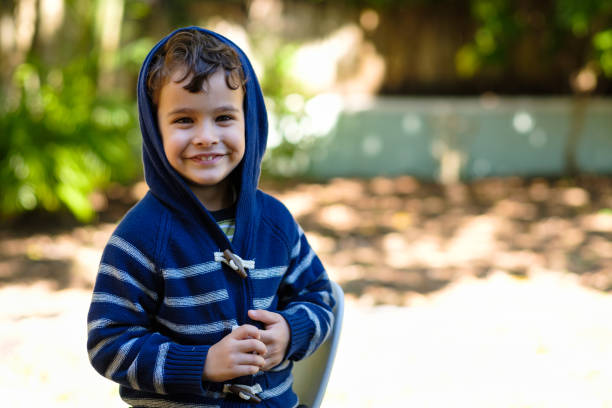 istock Cute boy outdoors 1281287598