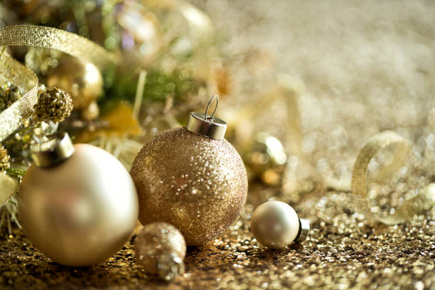 istock Christmas Gold Ornaments Background 1281287822