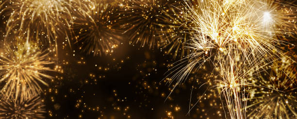 istock beautiful golden fireworks at night sky with copy space, golden magnificent firecrackers for cheerful party celebration 1281289033