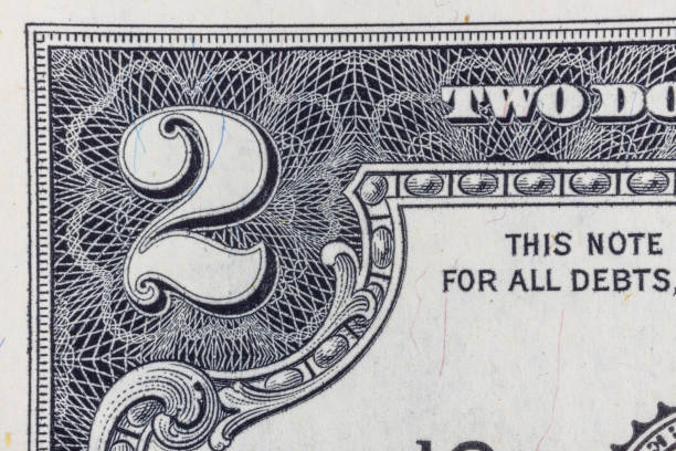 istock The two dollars closeup on a banknote 1281290601