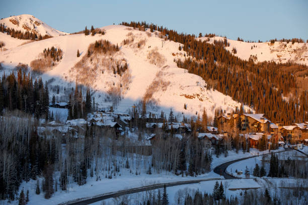 Sunrise on the ski slopes at Deer Valley, Utah, near Salt Lake City. Sunrise on the ski slopes at Deer Valley, Utah, near Salt Lake City. in Park City, UT, United States deer valley resort stock pictures, royalty-free photos & images