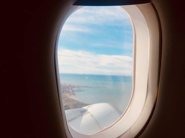 istock Aerial view from aeroplane window sky and clouds 1281293089