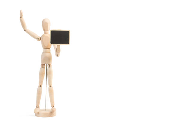 istock A Wooden mannequin toy on a white background 1281294539