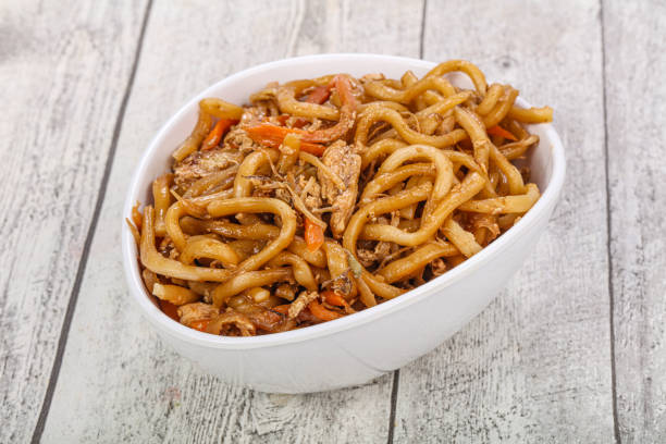 istock Wok with chicken and vegetables 1281295399